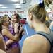 Six-year-old Faith Falzon plays and talks with the level nine gymnastics team on Monday, Jan. 28. Faith has a rare, incurable bowel disorder which forces her to spend most days in the hospital. Daniel Brenner I AnnArbor.com